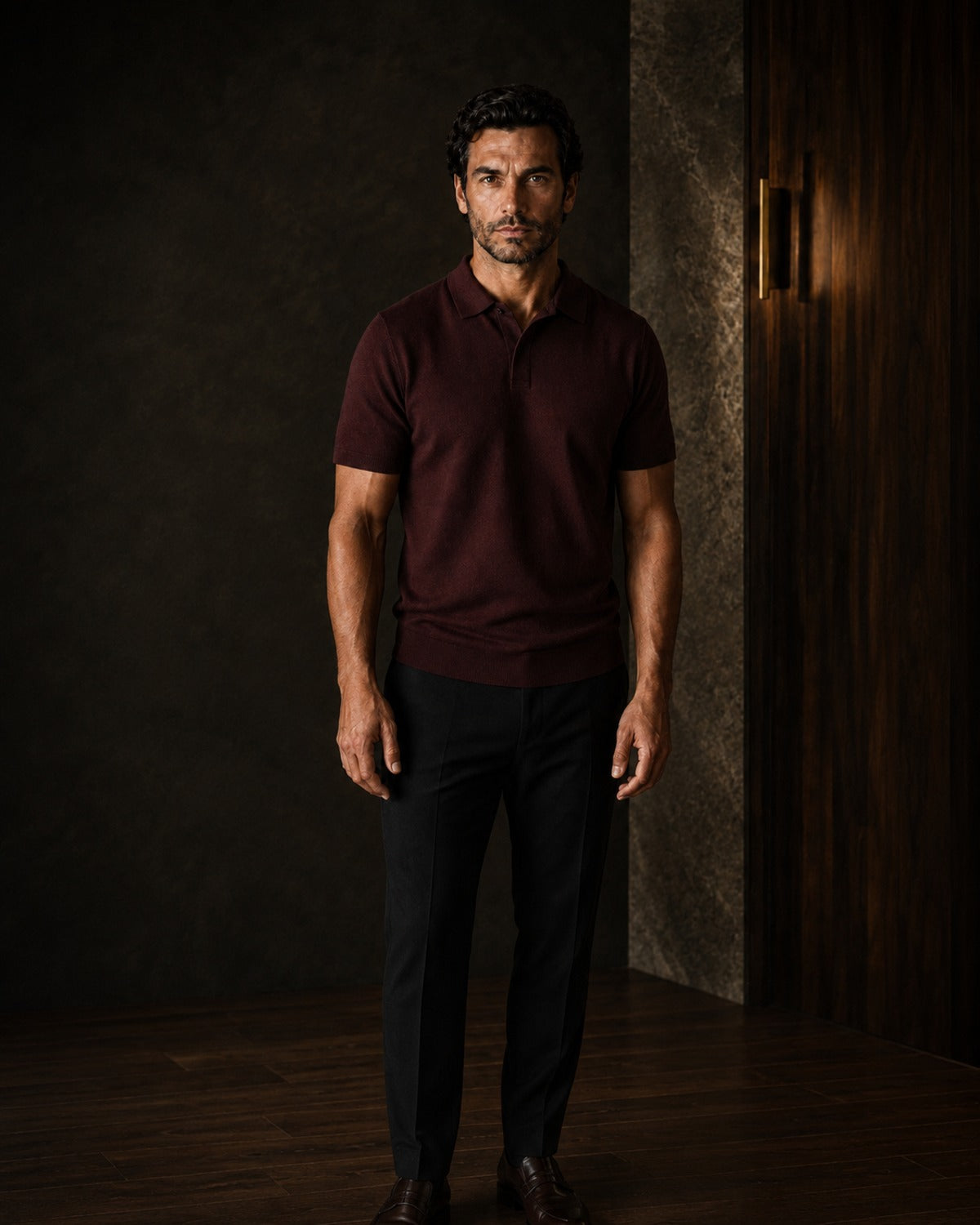 Ezeqiel man wearing a deep burgundy knitted polo